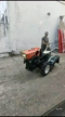 Imagem Micro Trator Tobatta M140 Diesel 14 CV com Enxada Rotativa e Roçadeira Frontal Ano 1990